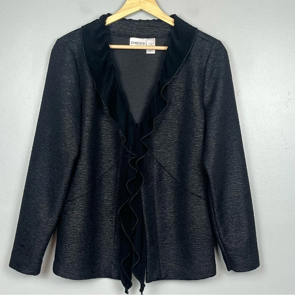 Chico’s black textured ruffled shawl collar single hook closure jacket, medium.